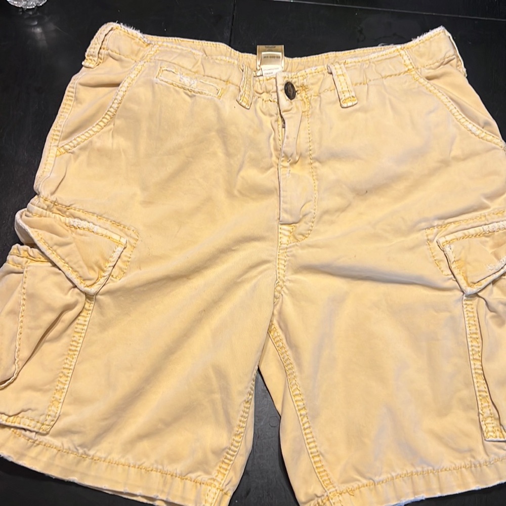 Yellow true religion cargo shorts size 33